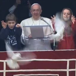 Two children from the Diocese of Rome's Catholic Action release doves as symbols of peace at the conclusion of Pope Francis’ Jan. 26 Angelus message.