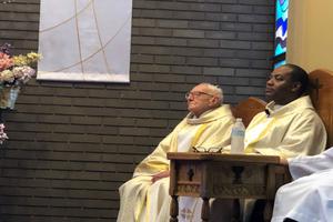 Deacon Larry Girard and Father Luke Iwuji at Saint Sebastian Church. 