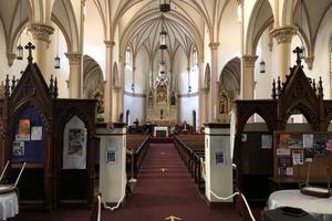 Above, St. Benedict the Moor is a personal parish in the Black Catholic tradition in Pittsburgh. Below is the interior of the Basilica of St. Mary of the Immaculate Conception in Norfolk, Virginia.