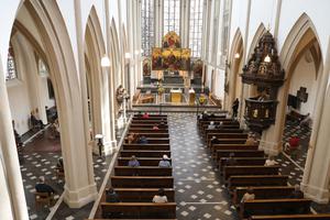 BONN, GERMANY - MAY 03: People arrive for mass at St. Remigius Catholic church for Sunday mass for the first time since March during the novel coronavirus crisis on May 3, 2020 in Bonn, Germany. (Photo by Andreas Rentz/Getty Images)