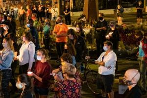 Above, participants take part in a candlelight vigil on Aug. 30 in Minneapolis. The community gathered in the intersection of 38th Street and Chicago Ave. to honor Jacob Blake, 29, who was shot on Aug. 23 by Wisconsin police officers. George Floyd died while in police custody as summer began, on Memorial Day, in Minneapolis.