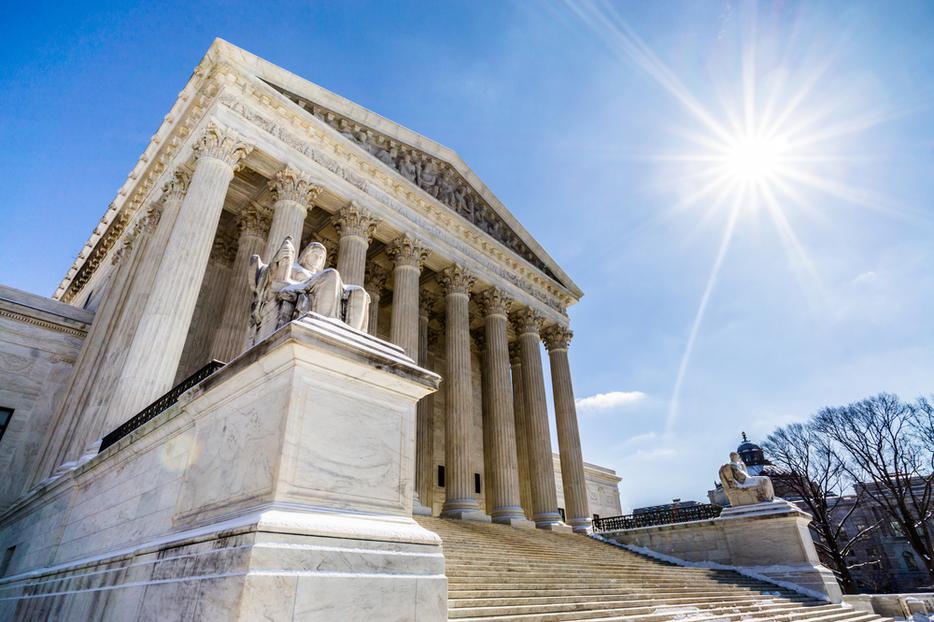 The Supreme Court of the United States in Washington, D.C. on a crisp Spring day.