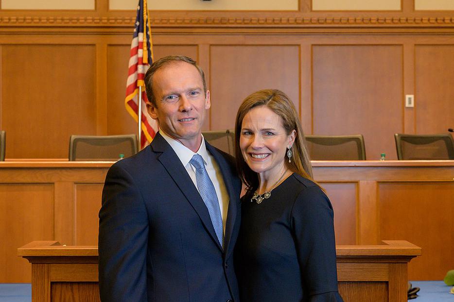 Judge Amy Coney Barrett alongside her husband, Jesse.