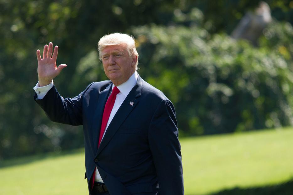 President Donald Trump walks from the west wing of the White House to Marine One before heading to Joint Base Andrews and on to Bedminster, NJ, Friday, August 4, 2017.