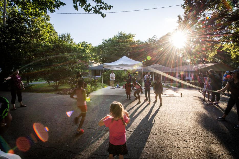 Children play at People of Praise  neighborhood picnic in Shreveport, LA.