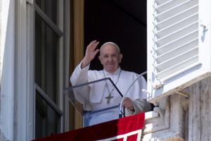 Pope Francis waves to pilgrims during his Angelus address August 30, 2020.
