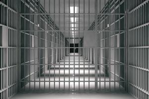Interior shot of a prison cell block.