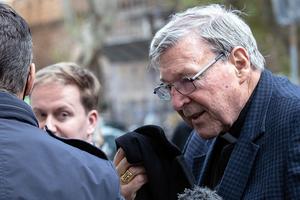 Cardinal George Pell returns to his residence in Rome, Sept. 30, 2020.