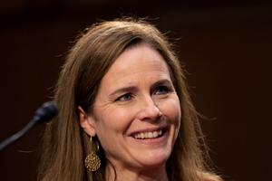 Supreme Court nominee Judge Amy Coney Barrett reacts to a question as she testifies before the Senate Judiciary Committee on the second day of her Supreme Court confirmation hearing on Capitol Hill on October 13, 2020 in Washington, DC.