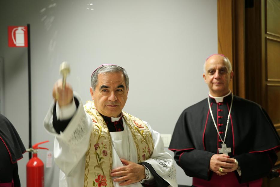 Cardinal Angelo Becciu and Mons. Fisichella at the Blessing and Inauguration of the Media Center and Pilgrimage Information Center for the Extraordinary Jubilee of Mercy on December 1, 2015.