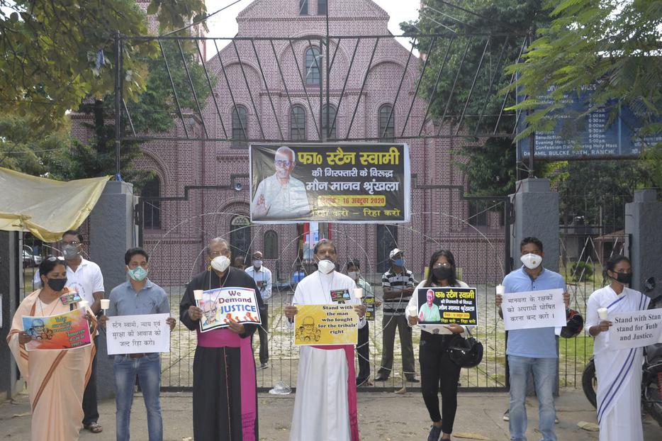 Archbishop Felix Toppo and auxiliary bishop Theodore Mascarenhas leading a protest in front of St. Mary's Cathedral in Ranchi where Fr Stan was arrested.