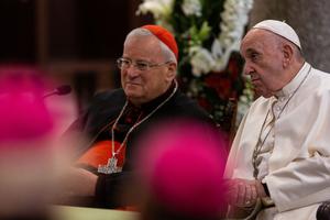 Cardinal Gualtiero Bassetti, president of the Italian Episcopal Conference, (Left) listens while Pope Francis addressed bishops from 19 Mediterranean countries in Bari, Italy on Jan. 22, 2020.
