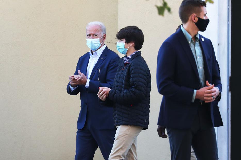 Presumptive President-elect Joe Biden (L) leaves St. Joseph on the Brandywine Roman Catholic Church after attending Sunday mass on November 08, 2020 in Wilmington, Delaware.