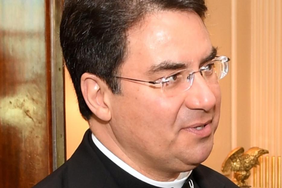 Bishop Oscar Cantú of the Diocese of Las Cruces and chair of the Committee on International Justice and Peace of the United States Conference of Catholic Bishops greets U.S. Secretary of State Rex Tillerson before a meeting at the U.S. Department of State in Washington, D.C. on March 23, 2017.