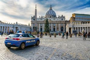 Italian police park in front of St. Peter's Basilica inside Vatican City. Italian police park in front of St. Peter's Basilica inside Vatican City.