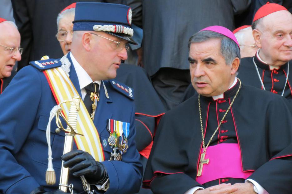 (L to R) Gendarme Captain Domenico Giani and Msgr. Angelo Becciu, substitute for General Affairs to the Secretary of State, attend the Gendarme parade for the feast of St. Michael the Archangel, their patron, on October 5, 2012.