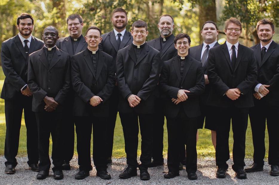 Chad Chermaie Jr., shown in the back row, third from left, along with seminarians from the Diocese of Diocese of Houma-Thibodaux, Louisiana, is pursuing his vocation after many years of much focus on football.