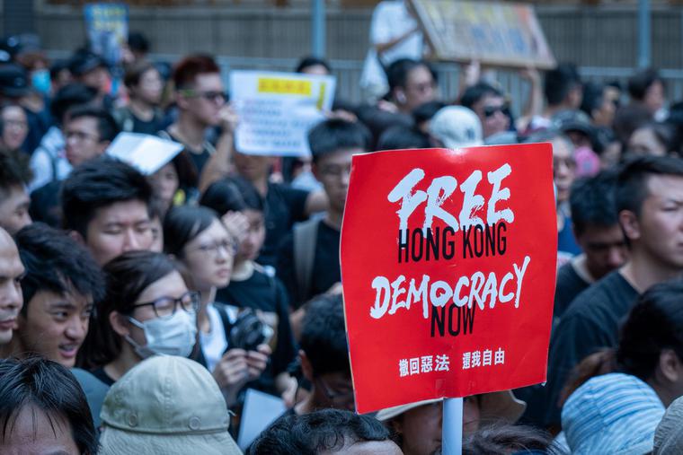 Protesters march in Sha Tin against Hong Kong's extradition bill in June 2019