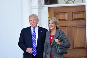 President Donald Trump with Education Secretary Betsy Devos in Bedminster, N.J. 2019.