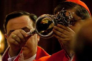 Cardinal Crecscenzio Sepe views the reliquary with the blood of St. Januarius in 2009.