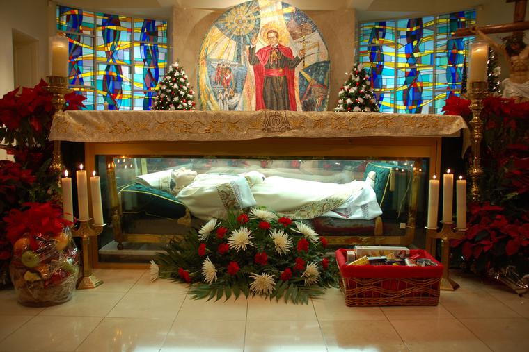 The remains of St. John Neumann enclosed within the glass altar of the National Shrine of Saint John Neumann, located in the lower church of the Parish of St. Peter the Apostle, Philadelphia, Pennsylvania, 2007.