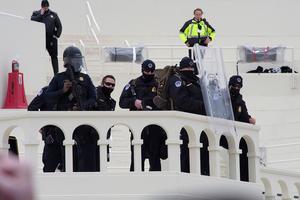 Police stand guard at the U.S. Capitol Building on Wednesday afternoon.