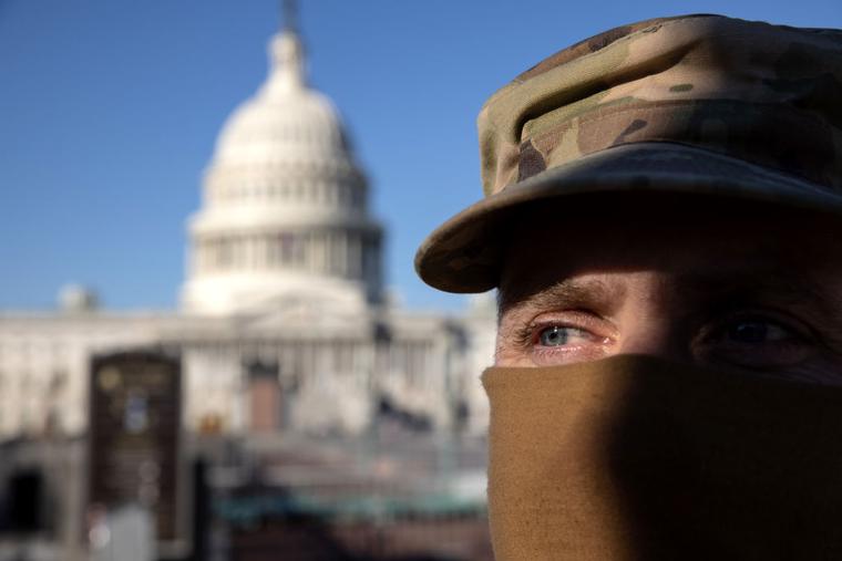 National Guard Sgt. Allan Gilbreath stands guard outside the east side of the U.S. Capitol on January 07, 2021 in Washington, DC.