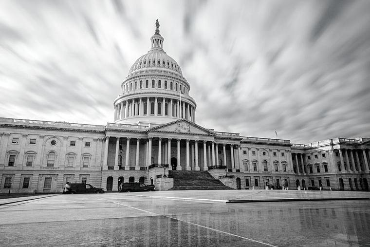 U.S. Capitol building in black and white.