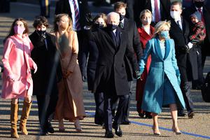 U.S. President Joe Biden and first lady Jill Biden and their family walk the abbreviated parade route after Biden's inauguration on Jan. 20 in Washington. Biden became the 46th president of the United States earlier today during the ceremony at the U.S. Capitol.
