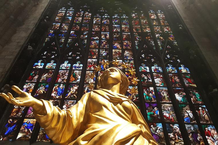 Statue and stained glass
