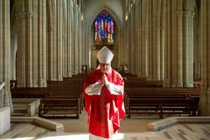 Archbishop John Wilson of Southwark delivers the Solemn Liturgy of the Passion on Good Friday, to an empty St Georges Cathedral on April 10, 2020 in London, England during the first wave of the pandemic lockdown.