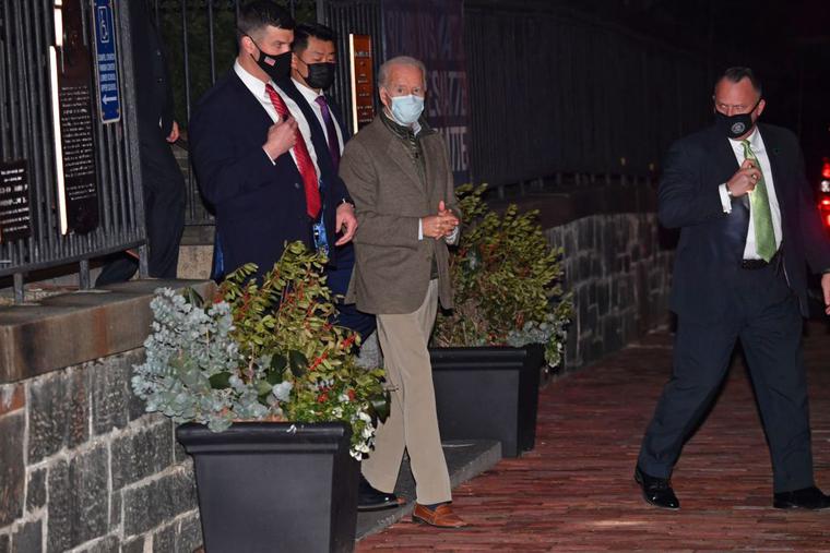 US President Joe Biden (C) leaves Holy Trinity Catholic Church after attending to mass in Washington, DC on January 30, 2021.