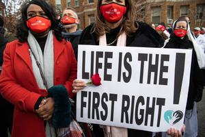 Members of the pro-life community participate in the "March for Life," an annual event to mark the anniversary of the 1973 Supreme Court case Roe v. Wade, which legalized abortion in the US, outside the US Supreme Court in Washington, DC, January 29, 2021. Members of the pro-life community participate in the "March for Life," an annual event to mark the anniversary of the 1973 Supreme Court case Roe v. Wade, which legalized abortion in the US, outside the US Supreme Court in Washington, DC, January 29, 2021.