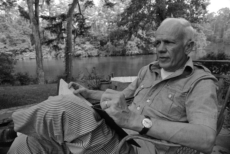 Novelist Walker Percy sits in his Covington, La., yard, June 8, 1977.