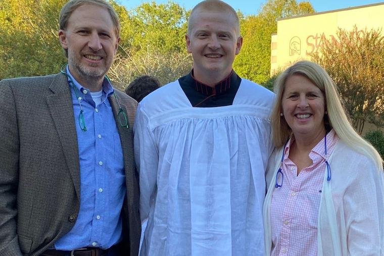 Seminarian John Cuppett is shown with his parents.