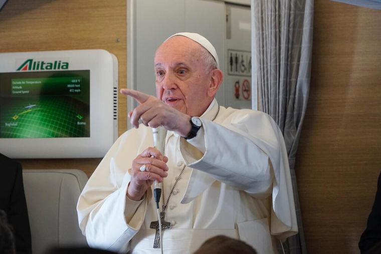 Pope Francis holds an in-flight press conference en route to Rome from Iraq