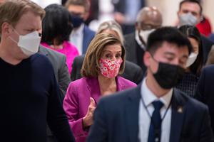 Speaker of the House Nancy Pelosi (D-CA) walks with staff and reporters after a news conference with House Democrats regarding the upcoming vote on the American Rescue Plan, on Capitol Hill in Washington, DC, on Tuesday.