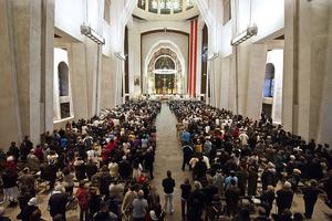 Worshippers pray during Mass Oct. 17, 2010, inside St. Joseph’s Oratory in Montreal. More than 1,000 Quebecers gathered to pray as their beloved Brother Andre Bessette was declared a saint. St. Andre, who died in 1937 at the age of 91, had a deep devotion to St. Joseph. Over the years, St. Joseph has been increasingly honored in the Mass.
