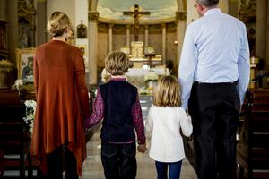 A family attends Sunday Mass.