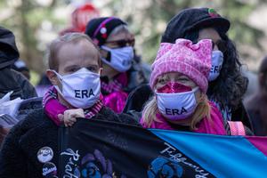 Demonstrators rally in Manhattan in support of the Equal Rights Amendment on the eve of International Women’s Day 2021.