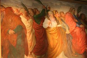 Jesus entering Jerusalem on Palm Sunday.