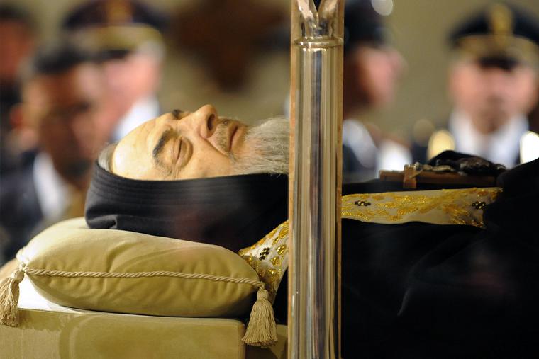 The body of Padre Pio is displayed for the veneration of the faithful in a part-glass coffin in the crypt of the old Church of St. Mary of Grace at San Giovanni Rotondo, Italy, on April 24, 2008.