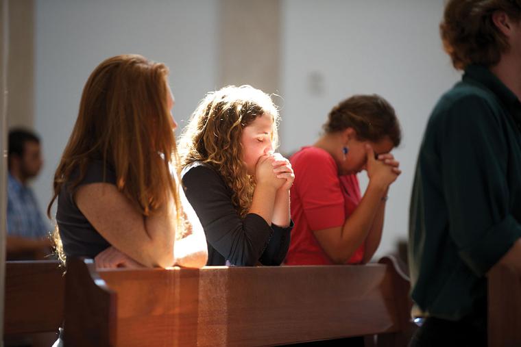 Students pray at Thomas Aquinas College in Santa Paula, California