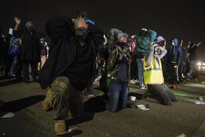 Protestors and City of Brooklyn Center Police Officers clash outside the Brooklyn Center Police Department on April 11, 2021 in Brooklyn Center, Minnesota after the killing of Daunte Wright. Photo: Chris Tuite/ImageSPACE /MediaPunch /IPX