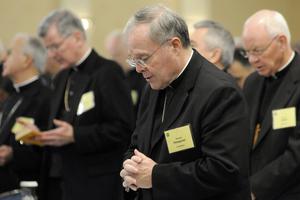 Bishop Michael J. Hoeppner of Crookston, Minn. prays during a semi-annual meeting of the United States Conference of Catholic Bishops, in Baltimore on Nov. 10, 2008.
