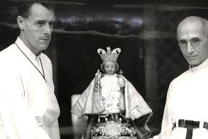 The statue of the Santo Niño is safely returned to Cebu City in the Philippines on April 3, 1945. Father McHugh of Ireland (l) and Augustinian Father Moran of Spain, hid the statue in the hills throughout the Japanese occupation of Cebu Island during World War II.