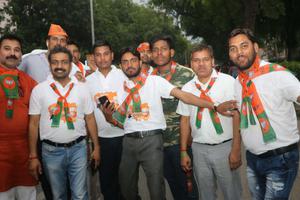 BJP supporters rejoice in front of party office in  New Delhi after May 2019 reelection victory