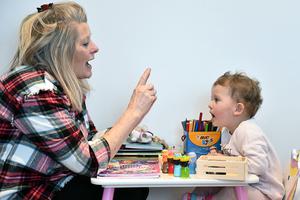 Two-year-old Blossom Walker, who is the photographer's niece, takes part in educational activities at her home by her grandmother, Claire Stirk, on Feb. 11 in Bradford, England.