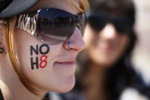 An activist wears a “no hate” message on her cheek at the 43rd L.A. Pride Parade on June 9, 2013, in West Hollywood, California. An activist wears a “no hate” message on her cheek at the 43rd L.A. Pride Parade on June 9, 2013, in West Hollywood, California.