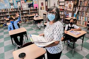 Ms. Sharon Rozzi instructs 5th grade students at East Boston Central Catholic school amid the COVID pandemic within the Archdiocese of Boston.